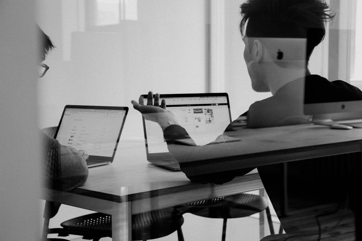 Workshop table session planning an AI income circuit demonstration project